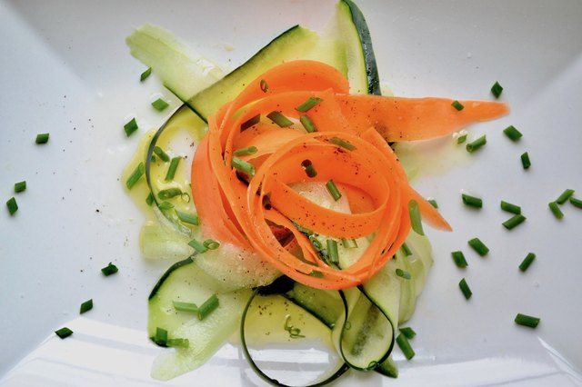 Carrots and Cucumbers on a marble tabletop