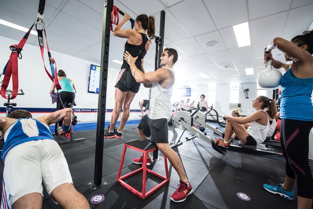 group of men and women in an F45 class working out