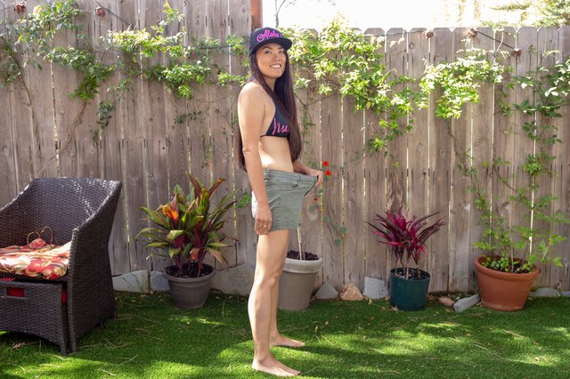 Kristina models an old pair of shorts