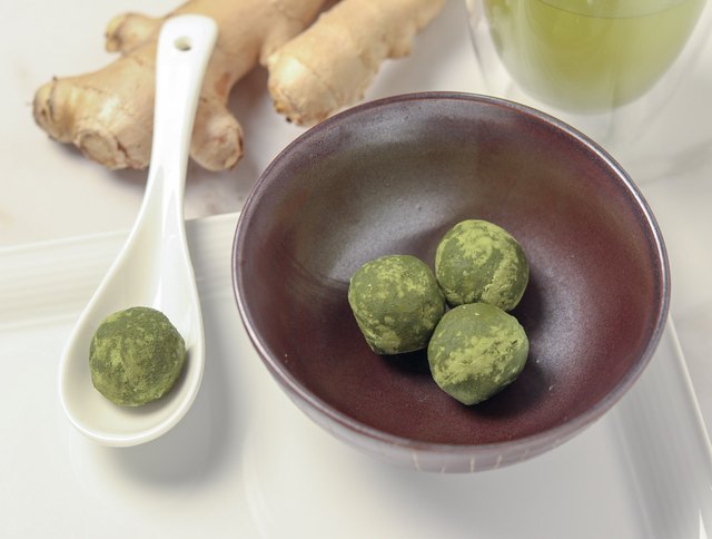 Matcha-ginger avo-truffle avocado coconut oil truffles with matcha green tea powder and ginger powder