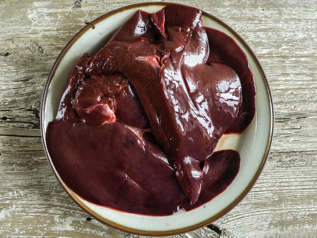 raw pork liver on a plate