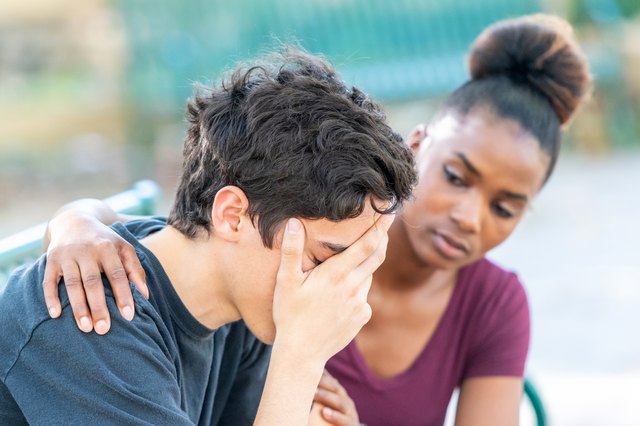 Diverse young couple, he is very stressed
