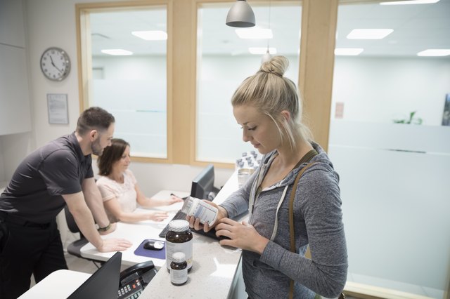 Woman purchasing supplements at physiotherapy clinic