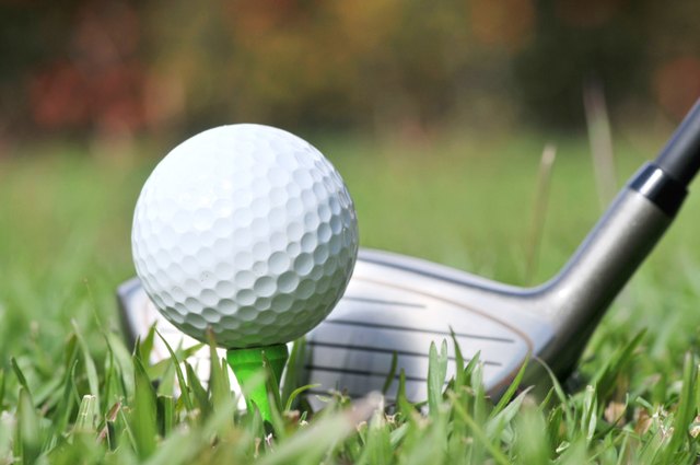 Close up of Golf Club and ball on the fairway