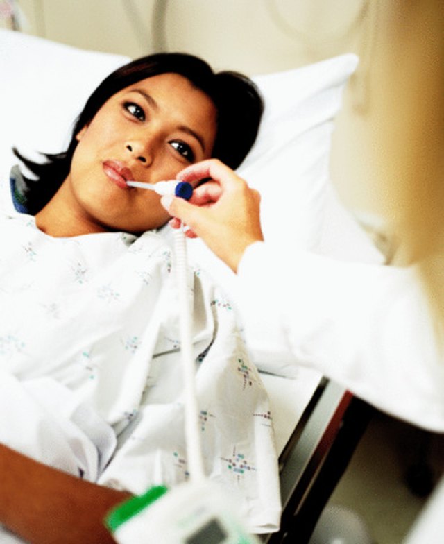 what causes sensitivity to light and fever