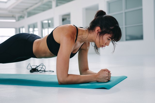 Burn away your belly fat with hanging leg raises!