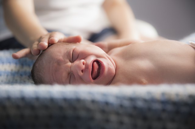 A pregnant woman and her newborn