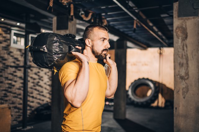 Sandbag Exercises: Burn Belly Fat, Build Muscle and a 10-Move Sandbag  Workout