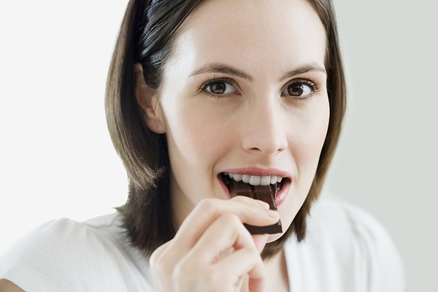 Woman eating chocolate