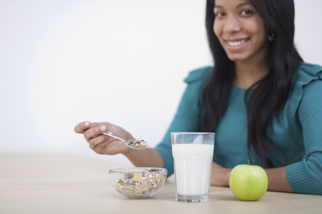 Young Cuban Woman Eating Cereals