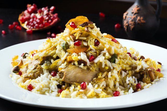 Festive middle eastern rice dish with chicken, orange peel and pistachios