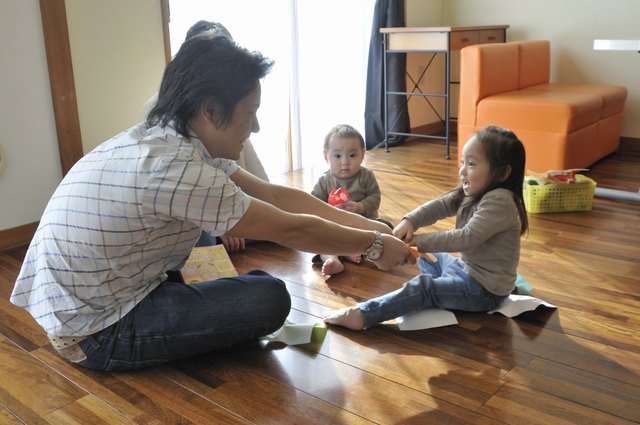Family Playing Together in Living Room