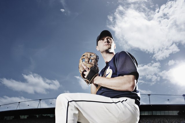 Baseball pitcher preparing to throw ball