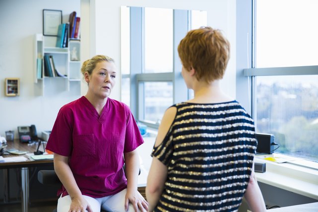 Doctor discussing with patient
