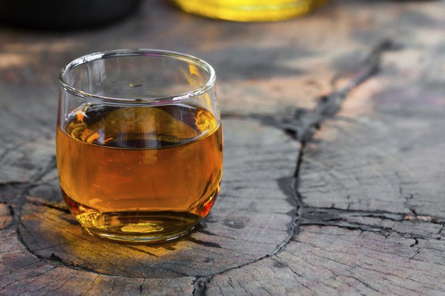 Golden Brown Whisky on the rocks in a glass