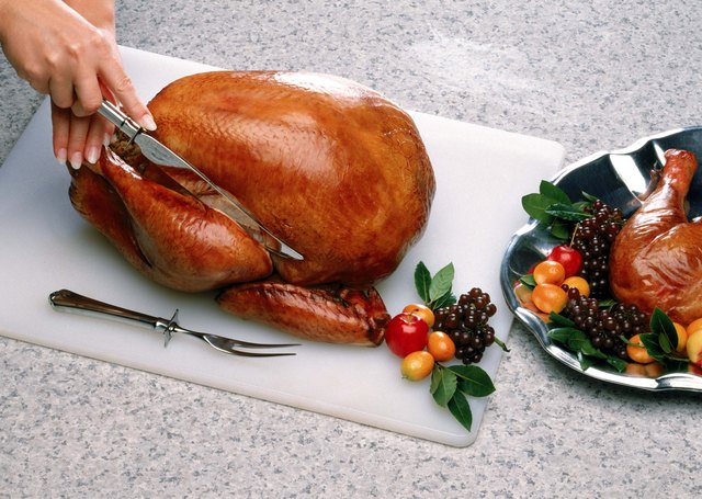 Person carving turkey