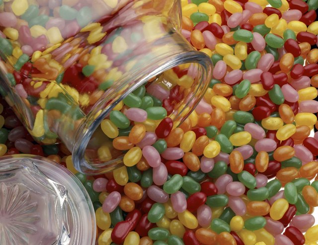 High angle view of jellybeans with a jar