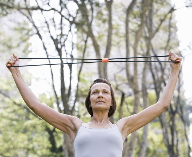 Woman working out with resistance band