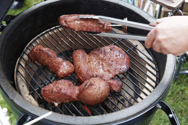 Venison being fried on grill