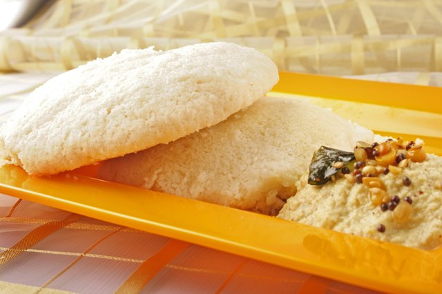 Idly served in a plate with chutney