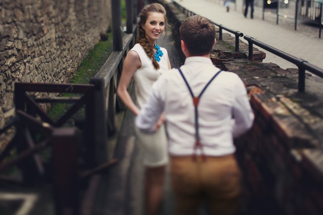 couple walk in old town lviv,kissing,loving.