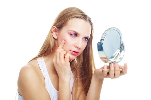 woman having skin problems