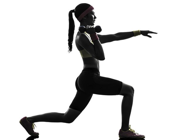 woman exercising fitness lunges workout silhouette