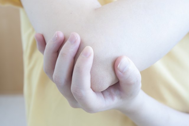 Pain in an elbow joint.