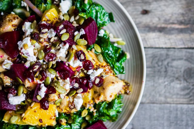 Healthy salad with grilled chicken,kale.beets and goat cheese