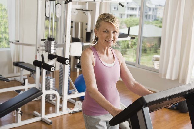 Woman on treadmill in home gym