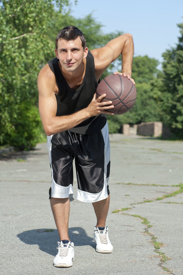 Young basketball player with ball