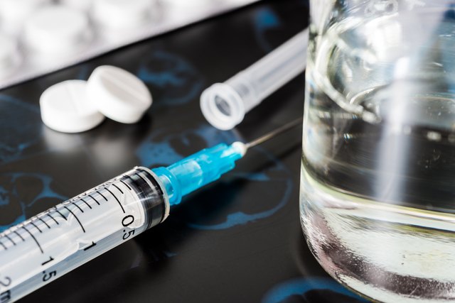 X-ray examination, syringe for injection and glass of the water