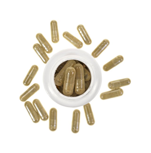 Green tea extract capsules with container