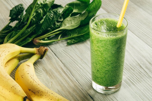Green Smoothies of spinach and banana in a glass