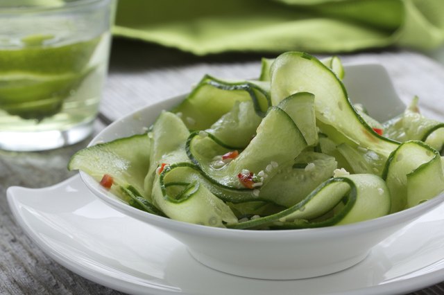 Salad of cucumber, sesame seeds and pepper.