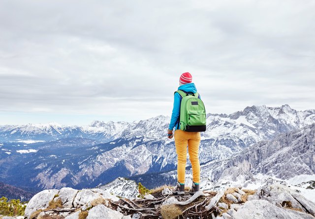 Woman on mountain peak
