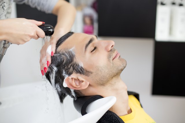 Young man at hairdresser