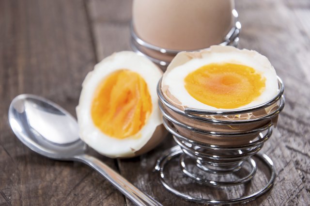 Halved egg on wood