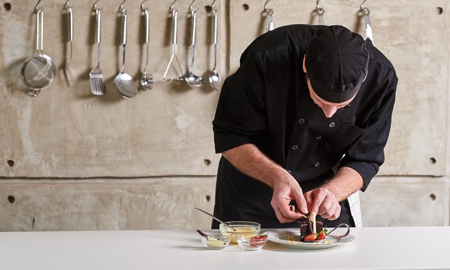 Restaurant hotel private chef preparing desert chocolate cake