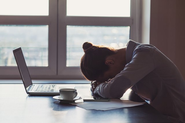 Tired woman in the office