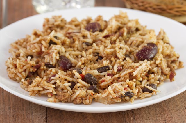 beans with meat and rice in the plate