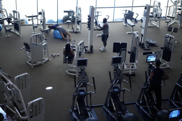 People working out in gym, elevated view