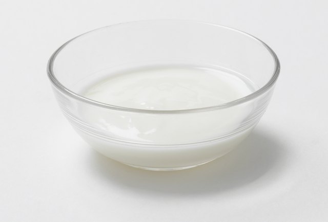Buttermilk in a glass bowl, studio shot