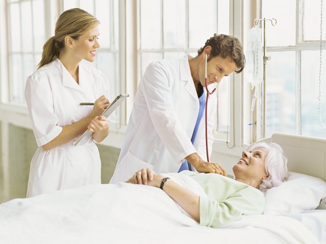 male doctor examining a patient