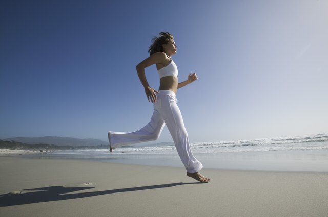 Woman running on beach