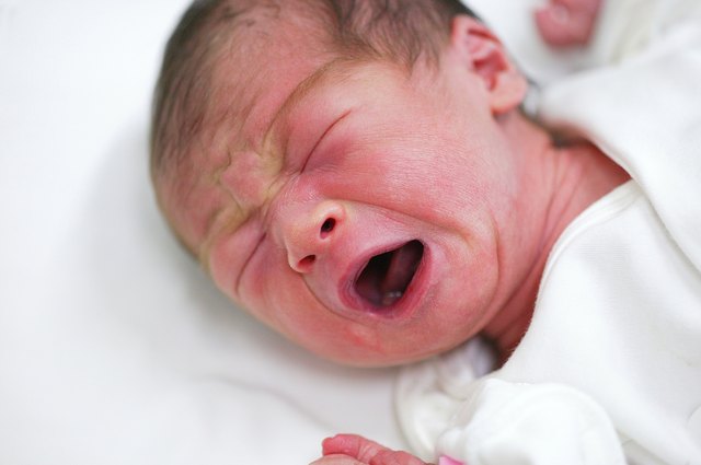 a crying newborn baby