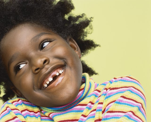Close-Up Portrait of a Young Girl With Gappy Teeth