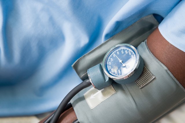 Blood pressure cuff on arm of patient