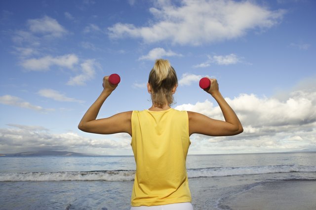 Woman using hand weights