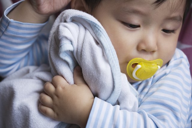 Baby Holding Blanket
